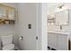 Charming half bathroom with a modern vessel sink and coordinated decor at 947 Middle Ground Ave, Rolesville, NC 27571