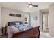 Comfortable bedroom features a ceiling fan, large window and en-suite access at 947 Middle Ground Ave, Rolesville, NC 27571