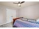 Cozy bedroom features soft carpet, ceiling fan and closet with double doors at 947 Middle Ground Ave, Rolesville, NC 27571