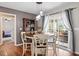 Cozy breakfast nook with natural light and view to the patio, perfect for starting the day at 947 Middle Ground Ave, Rolesville, NC 27571