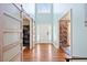 Bright foyer with hardwood floors, high ceilings, and stylish sliding barn doors at 947 Middle Ground Ave, Rolesville, NC 27571