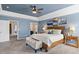 Spacious main bedroom features a trey ceiling and craftsman-style furniture at 947 Middle Ground Ave, Rolesville, NC 27571