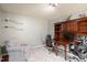 Cozy office space with a comfortable chair, a large desk and built-in storage at 947 Middle Ground Ave, Rolesville, NC 27571