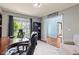 Bright office featuring a large window and workspace with comfortable seating at 947 Middle Ground Ave, Rolesville, NC 27571