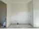 Bathroom under construction featuring tiled floors and plumbing fixtures awaiting installation at 10 Gambel Dr, Youngsville, NC 27596
