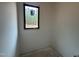 En suite bathroom featuring sleek window offering abundant natural light and a scenic view at 10 Gambel Dr, Youngsville, NC 27596