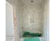 Bathroom featuring a tiled shower, offering potential for a unique and functional space at 10 Gambel Dr, Youngsville, NC 27596