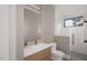 Contemporary bathroom with a sleek vanity, glass-enclosed shower, and modern fixtures at 10 Gambel Dr, Youngsville, NC 27596