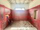 Bathroom under construction featuring tiled walls and floor, showcasing a modern design at 10 Gambel Dr, Youngsville, NC 27596