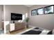 Modern bedroom with stylish furnishings, a large window view, and ample closet space at 10 Gambel Dr, Youngsville, NC 27596