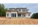 Modern two-story home featuring a contemporary design with large windows and unique architectural elements at 10 Gambel Dr, Youngsville, NC 27596