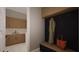 Convenient mudroom with built-in storage, bench seating, and easy access to the laundry area at 10 Gambel Dr, Youngsville, NC 27596