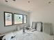 Bright room with large windows offering natural light and views, ready for finishing touches at 10 Gambel Dr, Youngsville, NC 27596