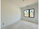 Bright room with a large window offering natural light and potential for a welcoming space at 10 Gambel Dr, Youngsville, NC 27596