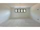 Bright room with a long window, offering potential for a cozy and inviting space at 10 Gambel Dr, Youngsville, NC 27596
