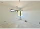 Bright room with corner windows offering natural light and potential for a welcoming space at 10 Gambel Dr, Youngsville, NC 27596