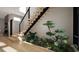 Unique staircase design with an integrated garden, bringing natural beauty into the home at 10 Gambel Dr, Youngsville, NC 27596