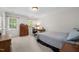 Bedroom with multiple windows and dresser at 102 Pin Oak Ct, Elon, NC 27244