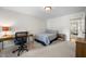 Bedroom featuring a desk and bedside table at 102 Pin Oak Ct, Elon, NC 27244