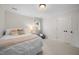 Bright bedroom with a comfortable bed, soft carpet, and ample closet space at 102 Pin Oak Ct, Elon, NC 27244