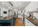 Well-equipped kitchen with stainless steel appliances and island at 102 Pin Oak Ct, Elon, NC 27244