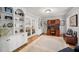 Well-lit office space with custom built-ins and plenty of natural light at 102 Pin Oak Ct, Elon, NC 27244