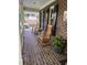 Inviting front porch with rocking chairs, perfect for relaxing and enjoying the outdoors at 102 Pin Oak Ct, Elon, NC 27244
