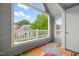 Balcony features a view of community and overhead string lights at 1061 Wirewood Dr # 303, Raleigh, NC 27605