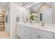 Bathroom with double vanity and white cabinetry at 1128 Neuse Ridge Dr, Clayton, NC 27527