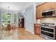 Kitchen with a dining area and stainless steel appliances at 1128 Neuse Ridge Dr, Clayton, NC 27527