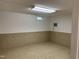 Unfinished basement with tile flooring and a small window at 1208 Hatch Rd, Chapel Hill, NC 27516