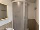 Small bathroom with enclosed shower and single vanity at 1208 Hatch Rd, Chapel Hill, NC 27516