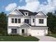 Charming two-story home with white siding, a two-car garage, and professional landscaping at 127 S Harvest Ridge Way # Homesite 321, Wilson's Mills, NC 27520