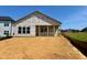 New construction home with porch and large windows in a suburban neighborhood at 139 W Crescent Mills Blvd # Homesite 235, Wilson's Mills, NC 27520