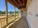 Framed patio shows future outdoor space with a view at 139 W Crescent Mills Blvd # Homesite 235, Wilson's Mills, NC 27520