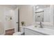 Bathroom featuring a modern white vanity, with open access to toilet and shower at 1401 Berea Rd, Rougemont, NC 27572