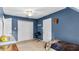 This bedroom features a carpeted floor, closet, and ceiling fan at 1401 Berea Rd, Rougemont, NC 27572