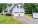 Two-story home features an attached two-car garage and manicured landscaping at 1401 Berea Rd, Rougemont, NC 27572