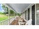 Inviting front porch with rocking chairs, perfect for relaxing and enjoying the outdoors at 1401 Berea Rd, Rougemont, NC 27572