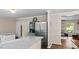 Spacious kitchen features granite countertops and stainless steel appliances with hardwood style floors at 1401 Berea Rd, Rougemont, NC 27572