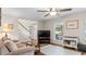 Inviting living room features hardwood flooring, neutral decor, and ample natural light at 1401 Berea Rd, Rougemont, NC 27572