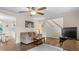 Bright and airy living room offers hardwood floors and staircase access, perfect for entertaining at 1401 Berea Rd, Rougemont, NC 27572