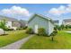 Charming shed with a walkway situated on a well-maintained lawn and landscaping at 1448 Big Falls Dr, Wendell, NC 27591