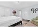 Bright bedroom featuring neutral paint, plush carpet, and white doors for a serene retreat at 1448 Big Falls Dr, Wendell, NC 27591