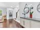Inviting entryway features hardwood floors and a decorative cabinet at 1448 Big Falls Dr, Wendell, NC 27591
