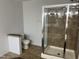 Bathroom with a glass shower and tile accents at 145 Country Walk Ln, Sanford, NC 27332