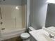 Bathroom featuring a tub shower combination, single vanity sink and tiled floors at 145 Country Walk Ln, Sanford, NC 27332