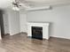 Living room featuring a fireplace and neutral color scheme at 145 Country Walk Ln, Sanford, NC 27332