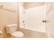 Bright bathroom features a shower/tub combo with white tile and modern fixtures at 145 Torrey Heights Ln, Durham, NC 27703
