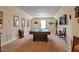 Spacious game room with a pool table, movie posters, and media setup at 15 Scuppernong Ln, Lillington, NC 27546